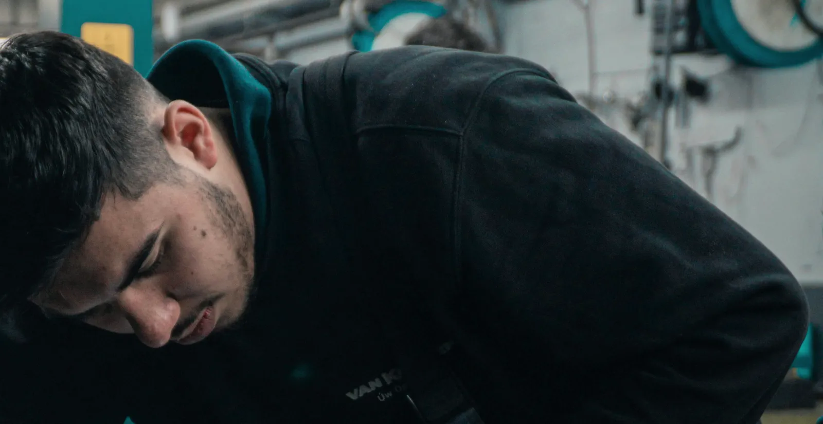 Mechanic working over an engine